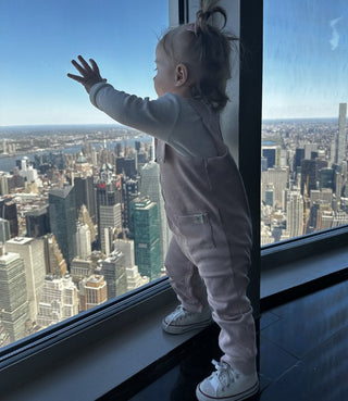 Baby Girl Looking out of the window