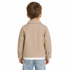 A child viewed from the back wearing a beige jacket over a white shirt and blue jeans, set against a plain white background.