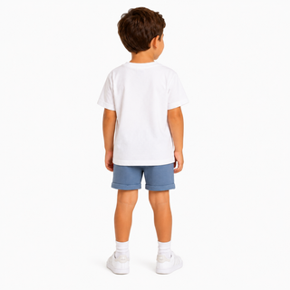 A child model shown from the back wearing a plain white short-sleeve t-shirt, blue shorts, white socks, and white trainers against a clean white background.