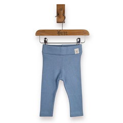 Light blue ribbed knit baby leggings hanging from a wooden hanger with the brand name Aneby visible on the hanger, against a plain white background.