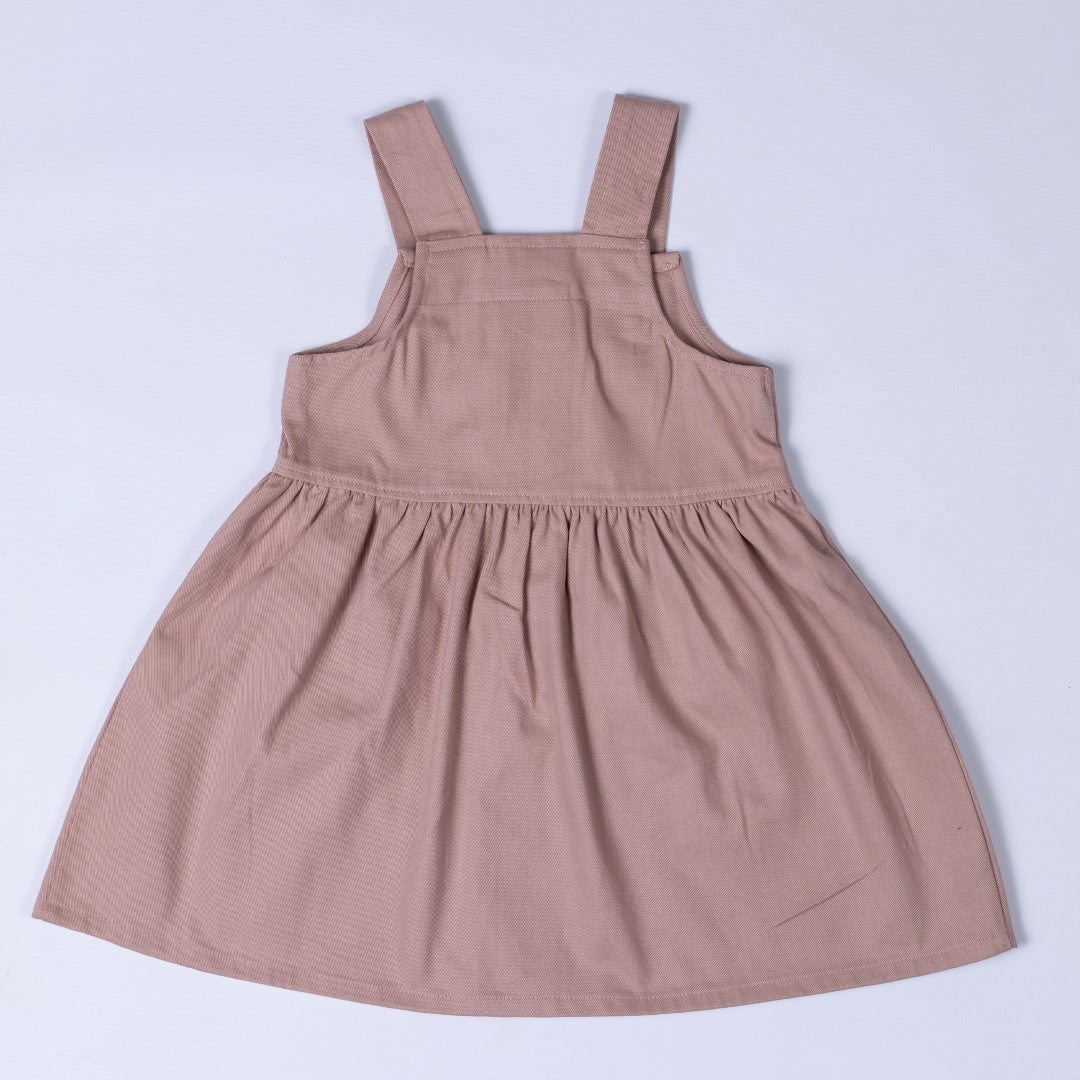 Back view of pleated dress in dusty pink