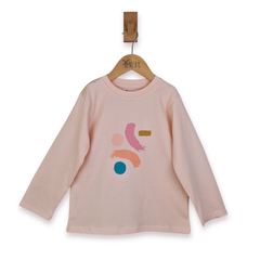 Pink long-sleeve shirt with colorful abstract design on a hanger against a white background