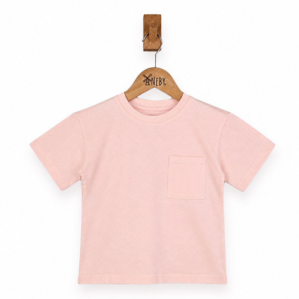 Pink t-shirt on a hanger with a white background