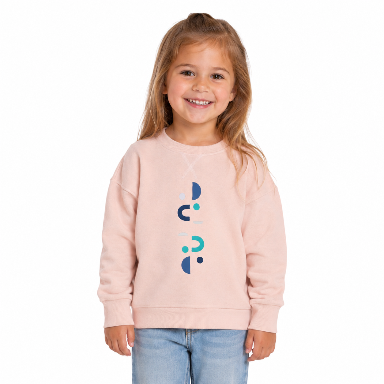 Child wearing a light pink sweatshirt with a colourful design on a white background