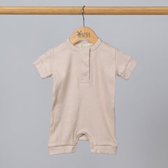 Product view of short playsuit from Aneby in beige