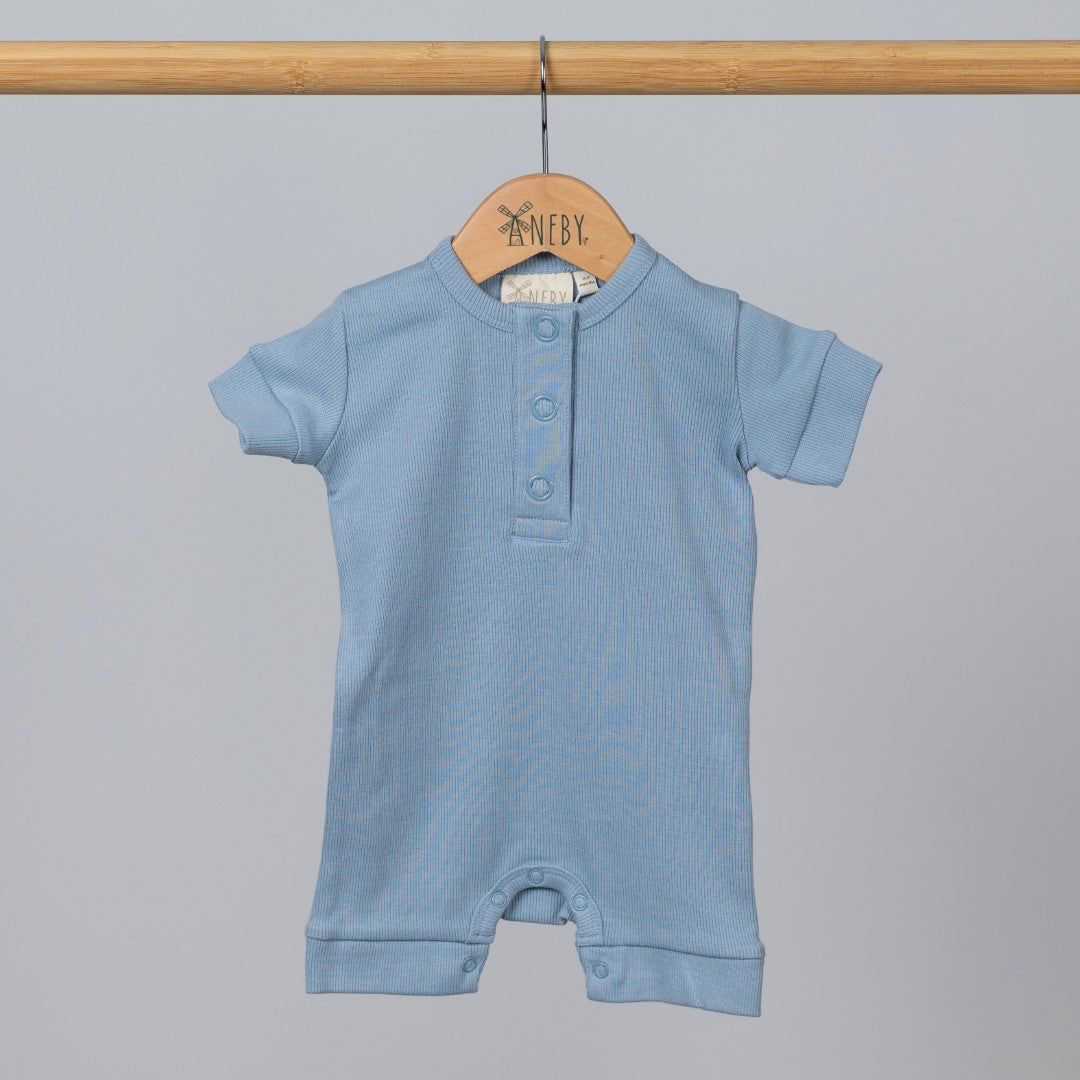 Product view of short playsuit from Aneby in blue