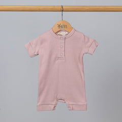 Product view of short playsuit from Aneby in pink