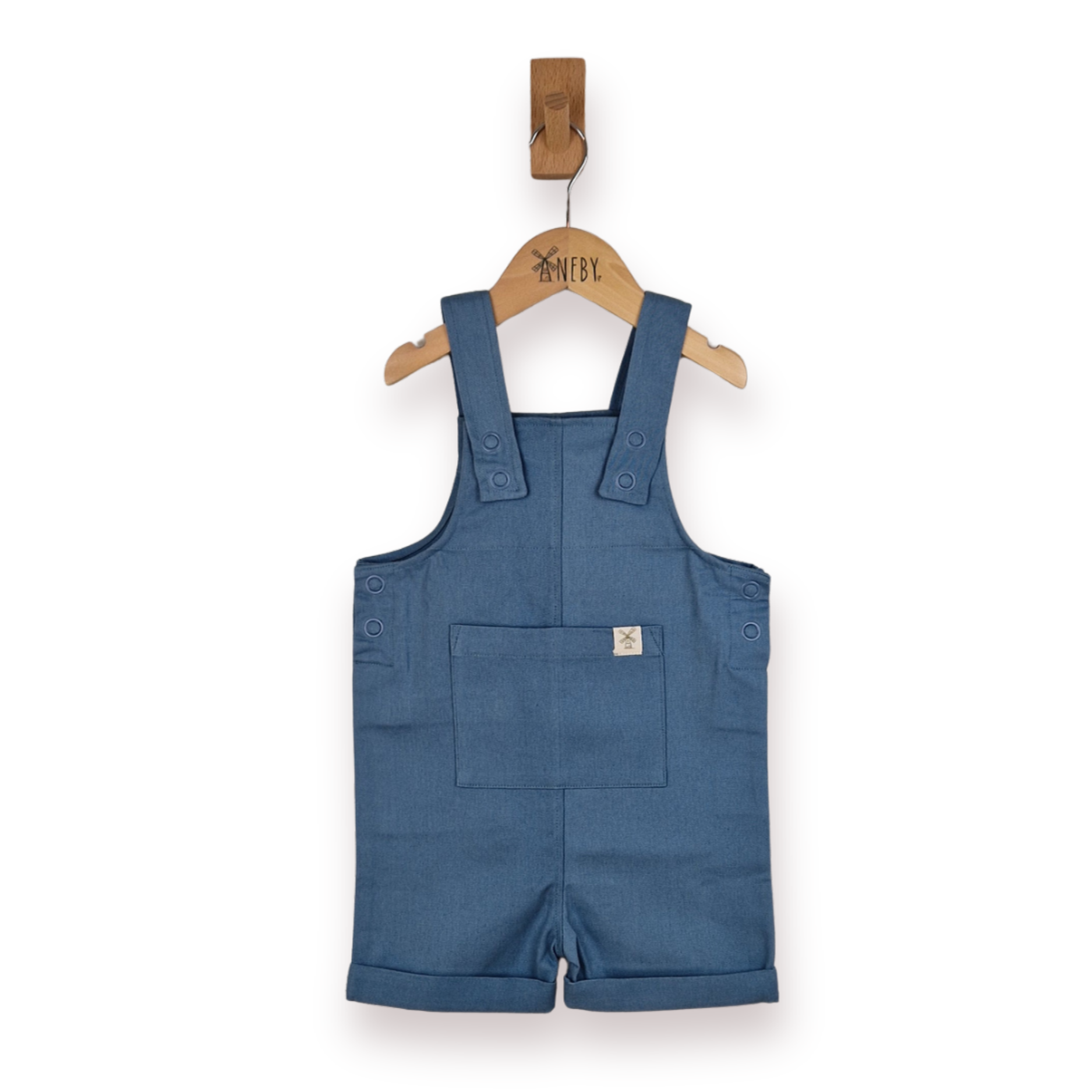 Flat lay of slate blue kids' cotton dungaree shorts, front view. The organic cotton fabric is soft and breathable, with a simple and timeless design.